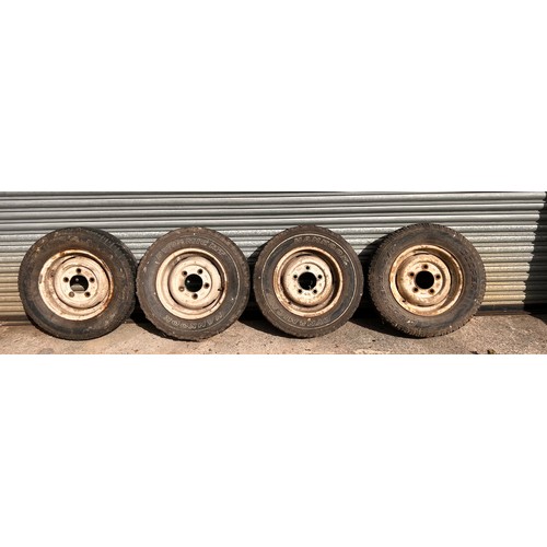 200 - Set of four Landrover series 3 wheels and tyres. 5.50f x 16 x33 with 205/80/r16 tires.