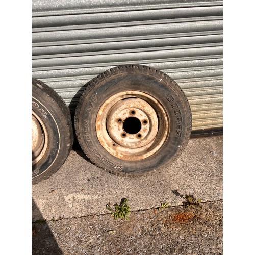 200 - Set of four Landrover series 3 wheels and tyres. 5.50f x 16 x33 with 205/80/r16 tires.