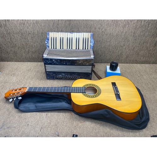 263 - acoustic guitar and accordion.