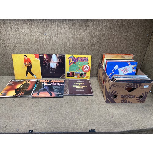 327 - Large selection of vinyl LP records including: Elvis, ABBA and The Drifters.