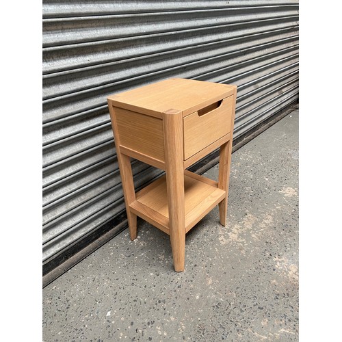 198 - Modern oak side table; 66cm x 30cm.