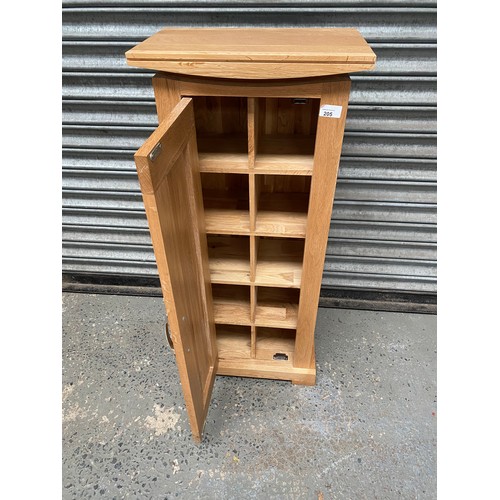 205 - Modern oak storage cabinet; 42cm x 94cm 26cm.