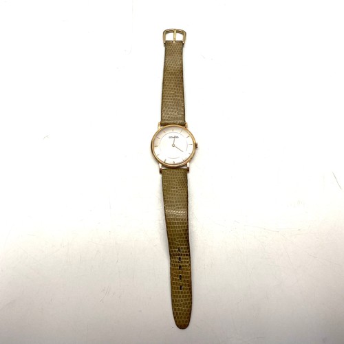 880 - Duward diplomatic 18kt gold manual watch (working).