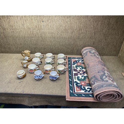 96 - Collection of vintage soup cups and a rug.