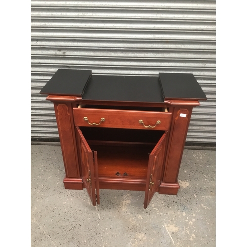 134 - Wooden buffet unit with flip top and double doors