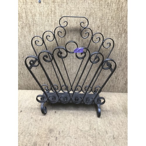 549 - Iron magazine rack.