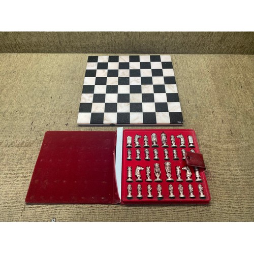 1198 - Marble chess board with metal pieces. (Chess Board by Rocha & Irmaos L.DA).