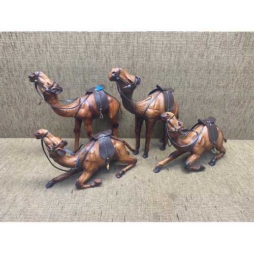 1199 - 4 vintage leather covered camels.