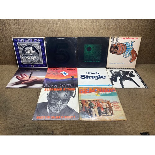 1045C - Collection of vinyl LP records and singles including: PIL, The Beachboys and Psychedelic Furs.