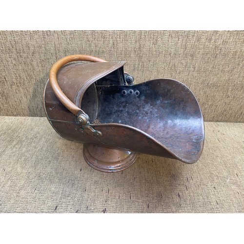 1057 - Vintage copper coal helmet with swing handle.