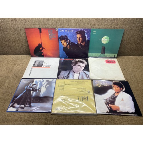 1070 - collection of vinyl LP records including: U2, UB40 and Michael Jackson.