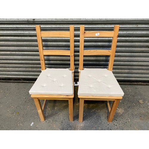 52 - pair of modern pine chairs.