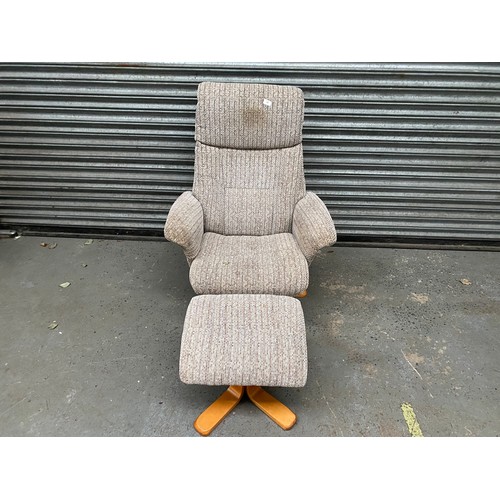 53 - modern recliner chair with foot stool.