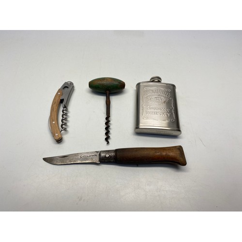 467 - vintage items including fold out knife, jack Daniels flask, and cork screws.