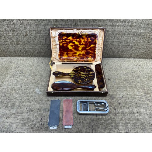 1082 - Vintage turtle shell style brush and mirror set.