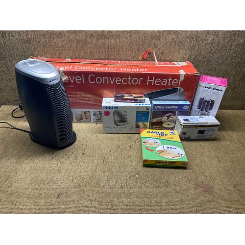 89 - Low level convector heater, electric sharpener and a 24 piece cutlery set.