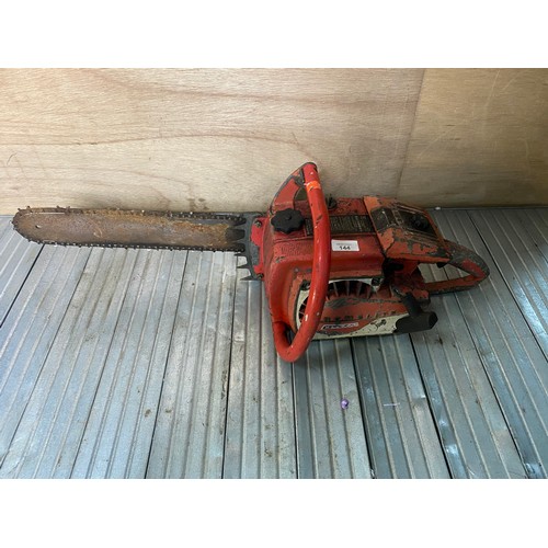 144 - Home light vintage chainsaw (with compression unstarted)