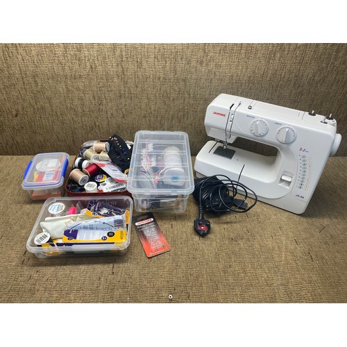 212 - Sewing machine, large selection of sowing and craft items.