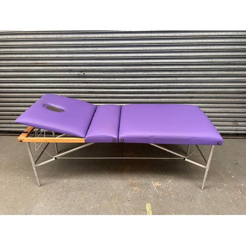 268 - Lilac massage table.