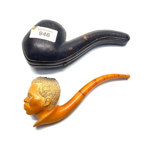 946 - meerschaum pipe of African origin with an amber pipe end.