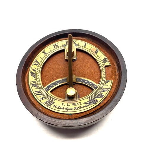 947 - Antique brass sundial by F. L. West, London in a hand carved box depicting Japans Mount Fuji.