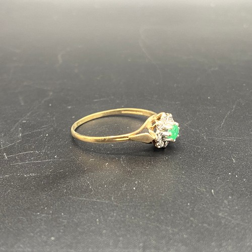 911 - 9KT Gold ring with emerald and diamonds. 1.6g .Size W.