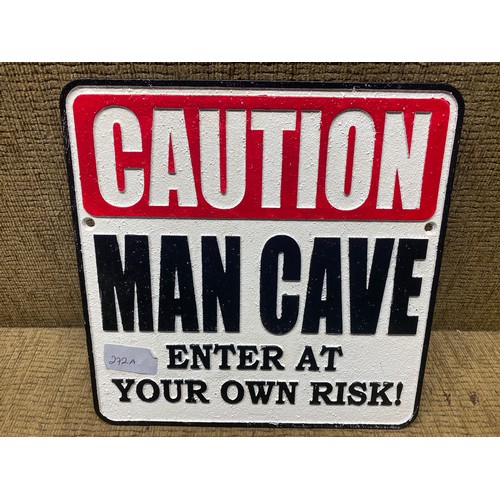 272A - Cast iron man cave sign.