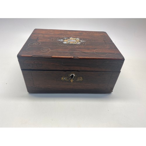 548 - Wooden box with mother of pearl marquetry.