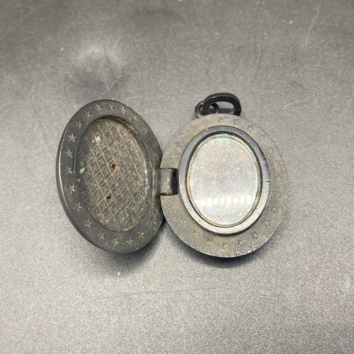 940 - Victorian vulcanite picture locket with sea pearl.