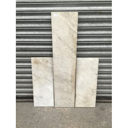 286 - Three slabs of  marble.