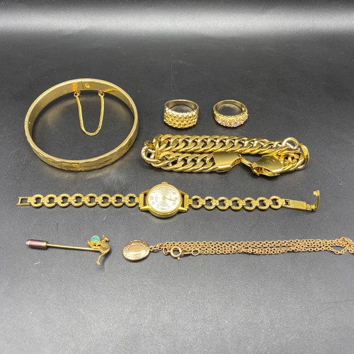 737 - Collection of gold plated items.