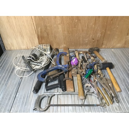 304 - mixed tools: hammers, loppers and a lamp.