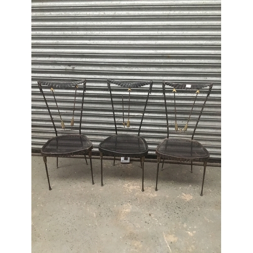 767 - Three possibly French wrought iron arrow back chairs slight damage