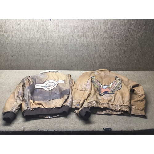 335 - Two vintage leather flying jackets size small