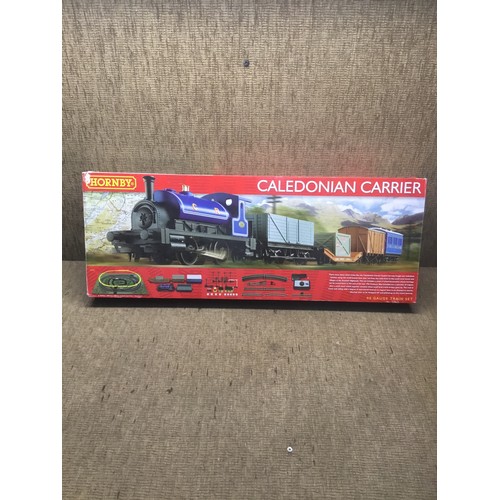 1085 - Hornby Caledonian carrier H/0 gauge train set.