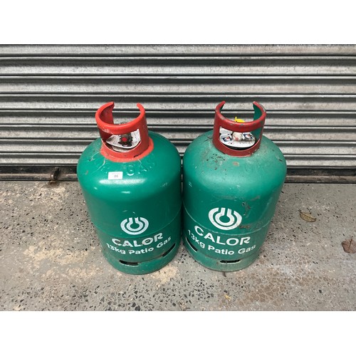 86 - Two 13kg Calor patio gas bottles, one full and one with a quarter.