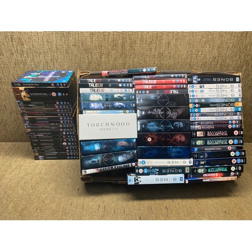 141A - Large selection of DVD box sets including: Battle Star Galactica, True Blood and Bones.