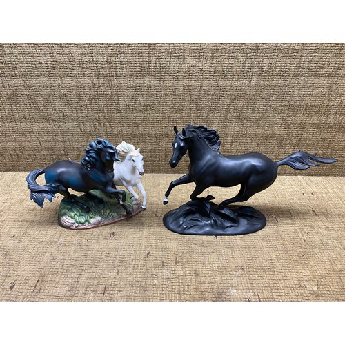 761 - 2 franklin mint statues of Black Beauty by Pamela Du Boulay.