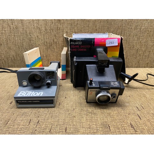 763 - 2 vintage polaroid cameras.