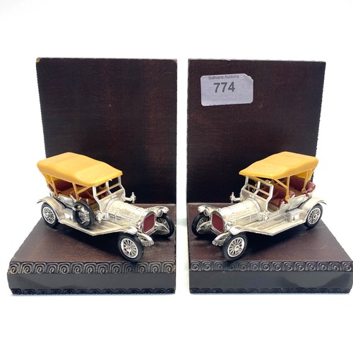 774 - Pair of wooden bookends with pre war car figures, possibly Rolls Royce.