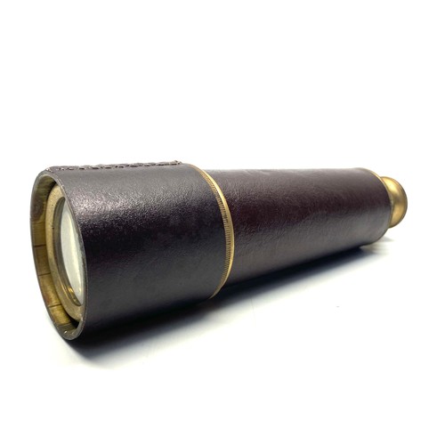 776 - Telescope with a leather case.