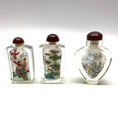 788 - Three chinese glass scent bottles painted on the inside.