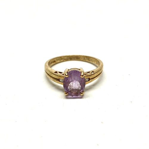 713 - 9ct gold ring with large amethyst stone, size N, 2.6g