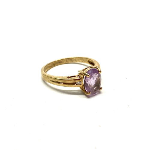 713 - 9ct gold ring with large amethyst stone, size N, 2.6g