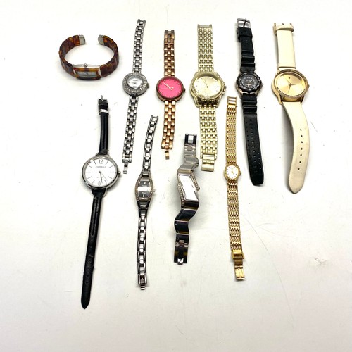 402 - 10 ladies watches.