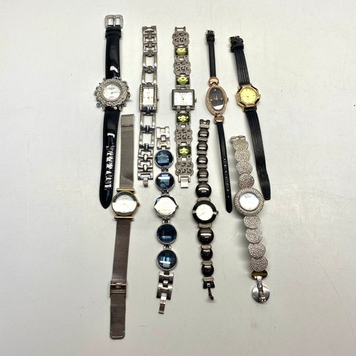 404 - Selection of 9 ladies watches.