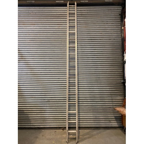 94 - Large double ladder and wall bracket.