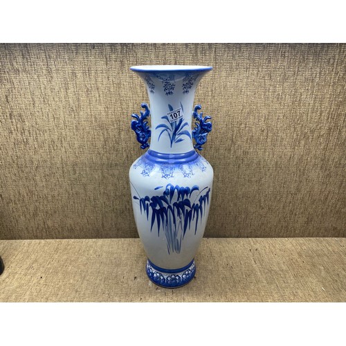 107 - Vintage blue and white ceramic vase.