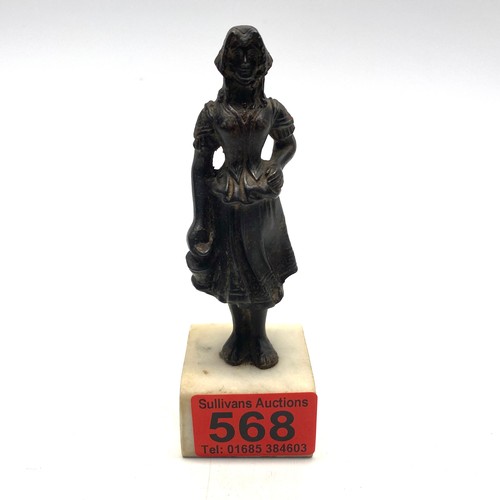 568 - Iron figure of a lady holding a claret (possibly French).