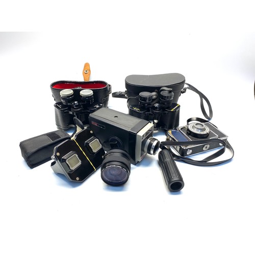 591 - 2 binoculars and vintage cameras.